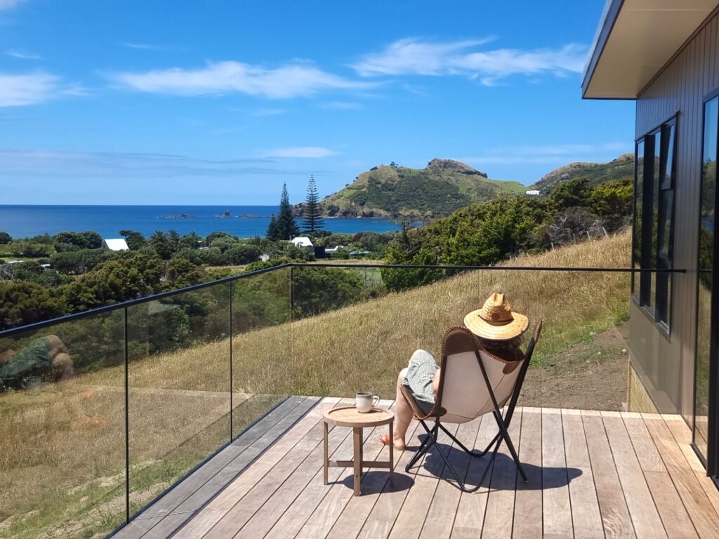 Veranda overlooking beach at Great Barrier Island Accommodation at Medlands Beach